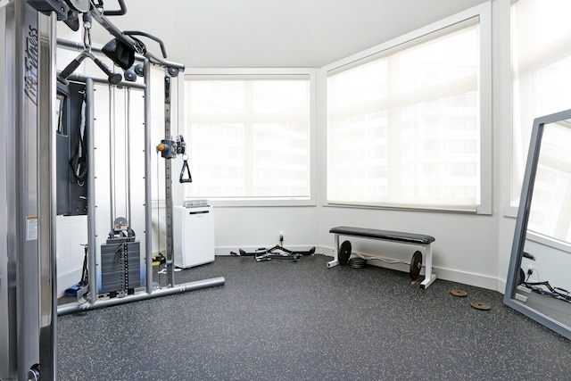 workout area with baseboards