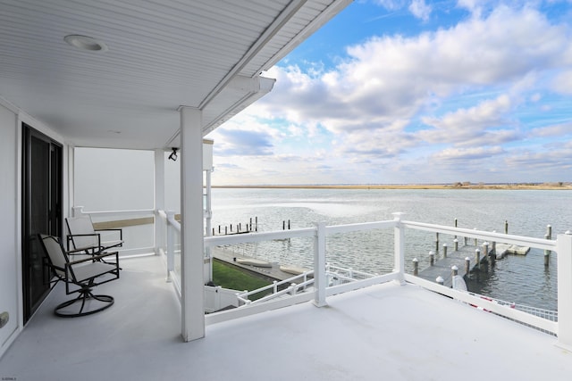 balcony featuring a water view