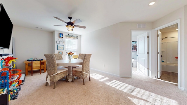 carpeted dining area with baseboards, visible vents, a ceiling fan, and recessed lighting