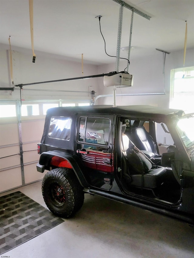 garage featuring a garage door opener