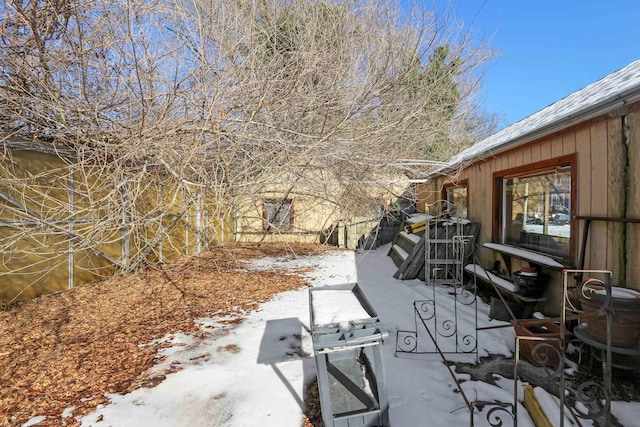 view of snow covered patio