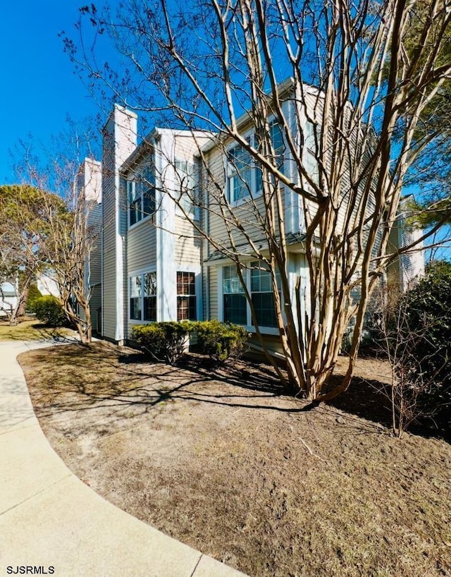 view of front of home with a chimney