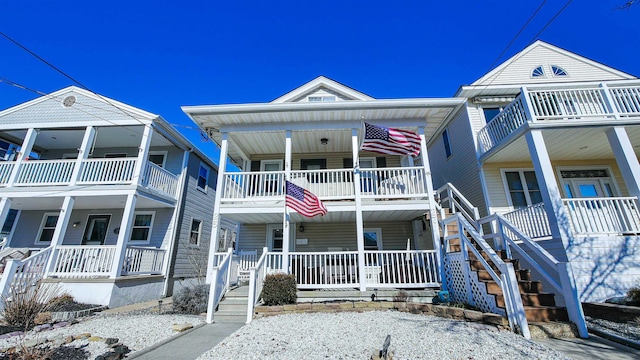 view of front of home with stairs