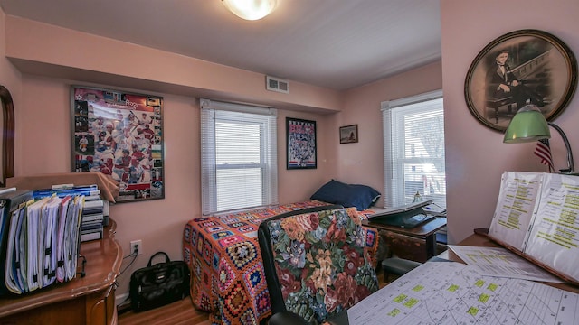 bedroom with visible vents