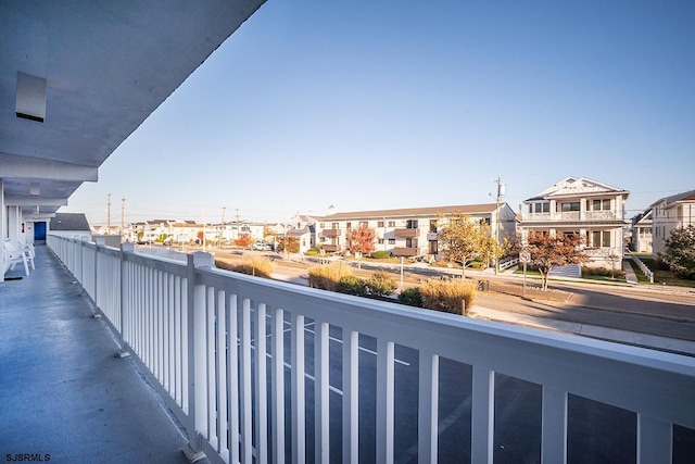 balcony featuring a residential view