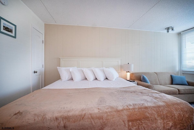 bedroom featuring a textured ceiling