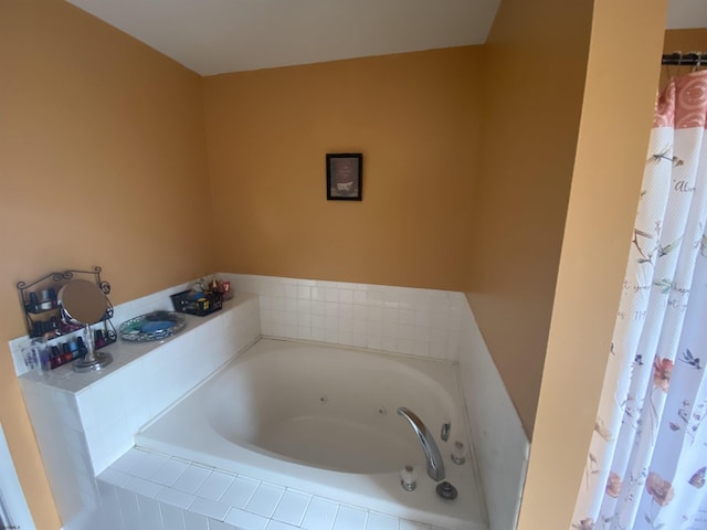 full bath featuring a whirlpool tub