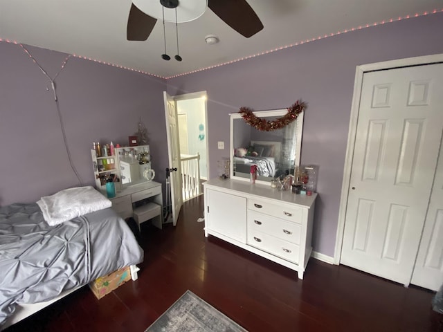 bedroom featuring dark wood-style flooring and a ceiling fan