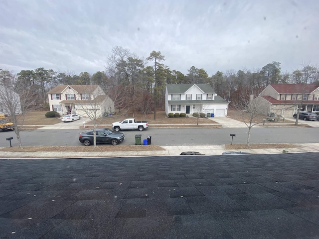 view of street with sidewalks and curbs