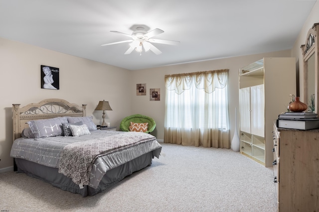 bedroom featuring a ceiling fan and carpet flooring