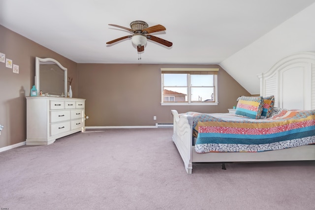 bedroom with a baseboard radiator, baseboards, vaulted ceiling, and light colored carpet