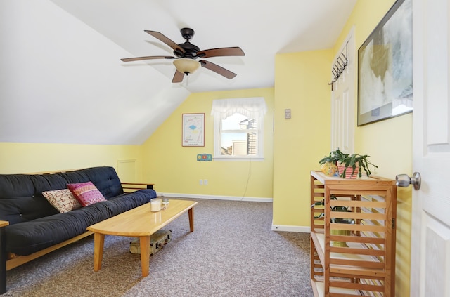 living area with carpet floors, lofted ceiling, baseboards, and a ceiling fan