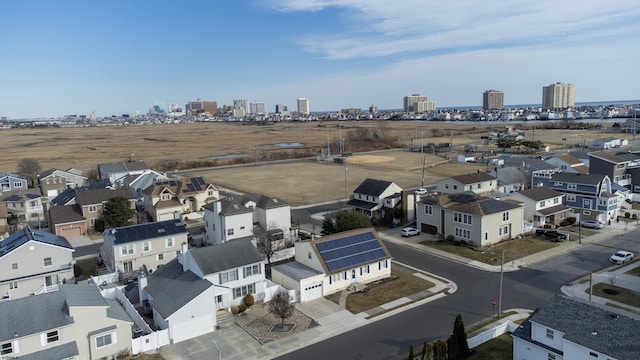 birds eye view of property with a city view