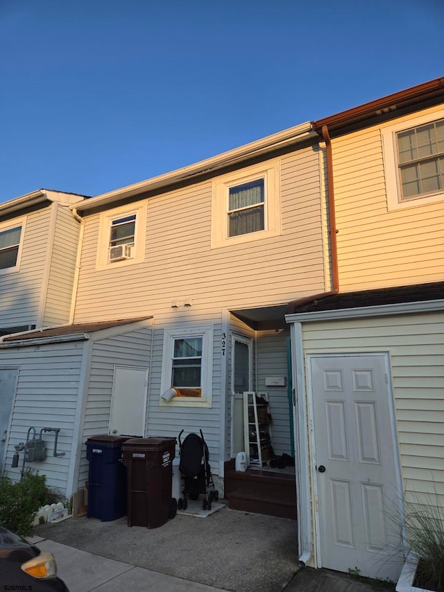 rear view of house featuring a patio