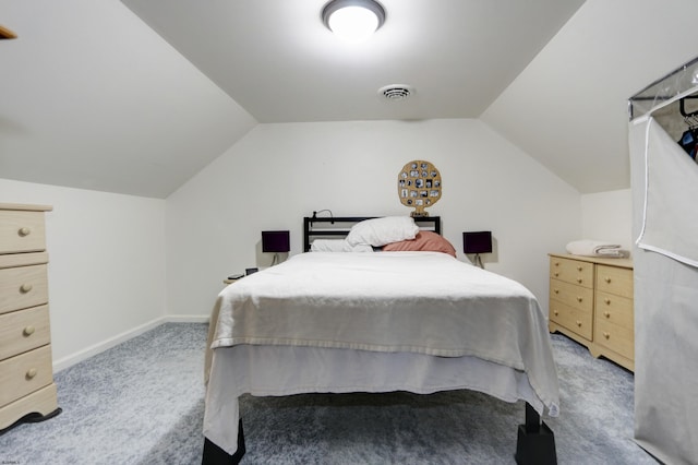 bedroom featuring light colored carpet, visible vents, lofted ceiling, and baseboards