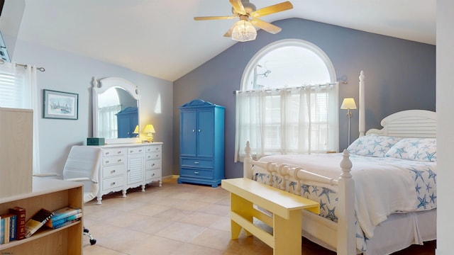 bedroom with a ceiling fan and vaulted ceiling