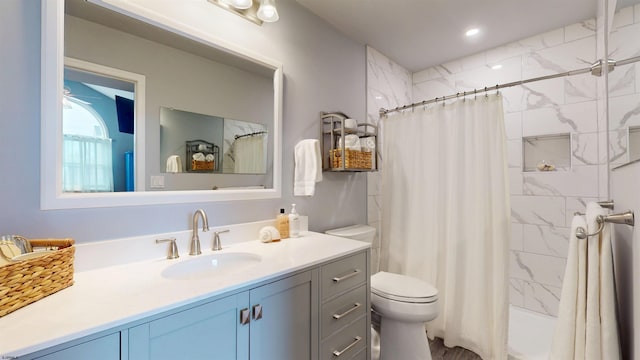 full bath featuring toilet, vanity, and shower / bathtub combination with curtain