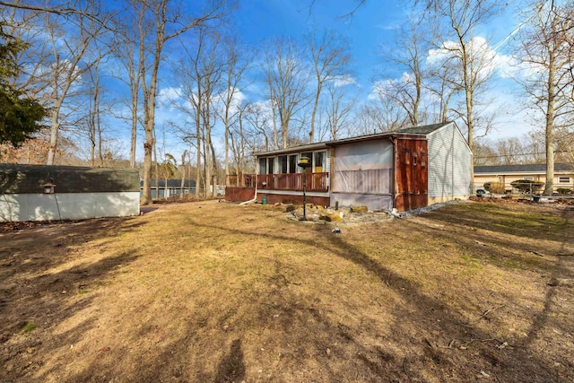 view of yard featuring a deck