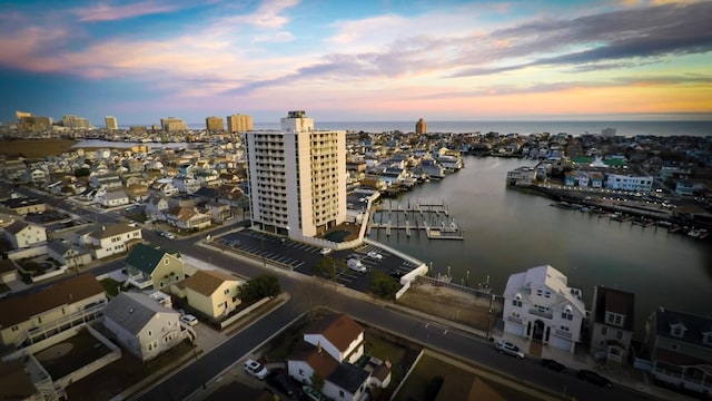 drone / aerial view with a water view and a city view