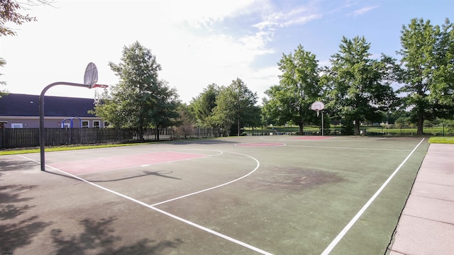 view of sport court featuring community basketball court and fence