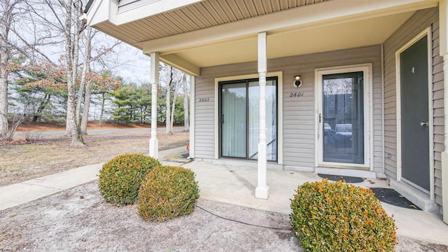 doorway to property with a porch