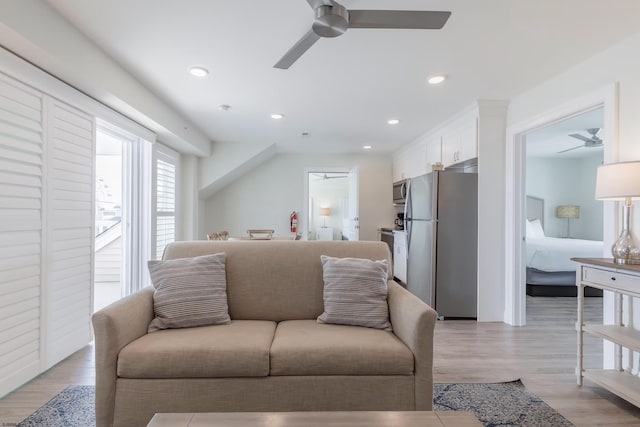 living room featuring light wood-style floors, recessed lighting, and ceiling fan