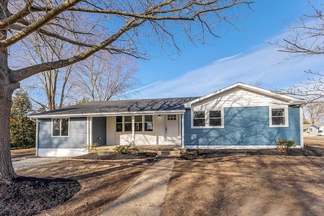 single story home featuring covered porch