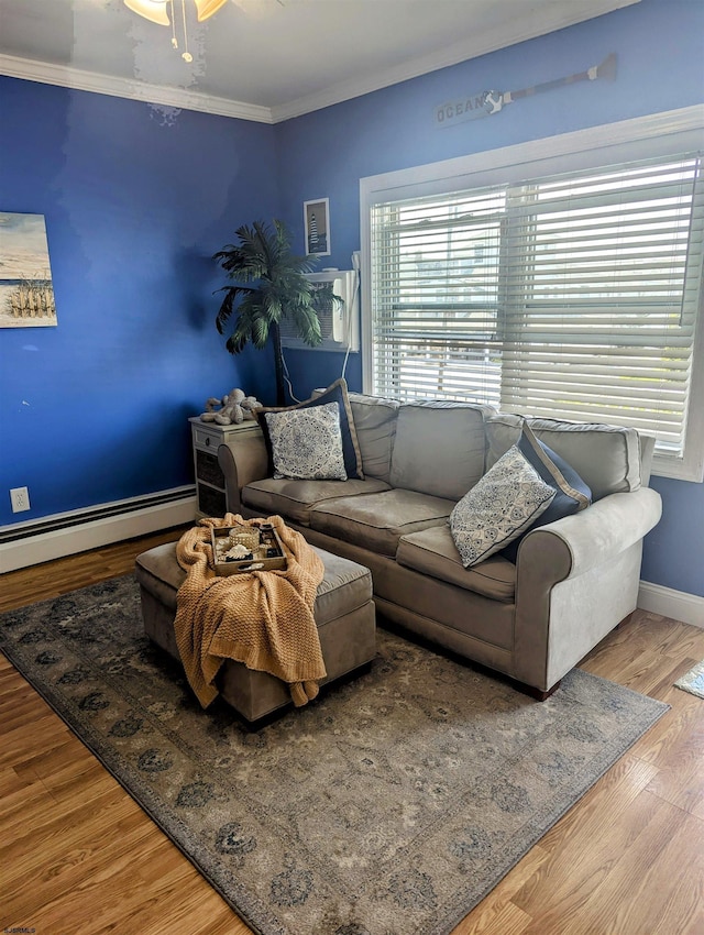 3500 Ocean Ave Unit 6, Brigantine, NJ 08203 - living area featuring crown molding, baseboards, wood finished floors, and baseboard heating