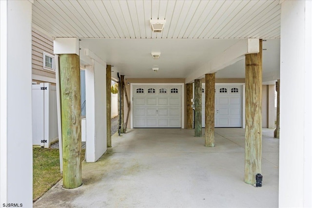 garage featuring driveway