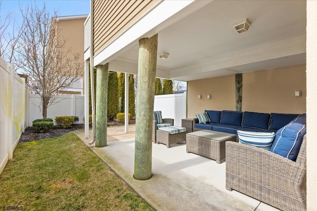 view of patio featuring a fenced backyard and an outdoor living space