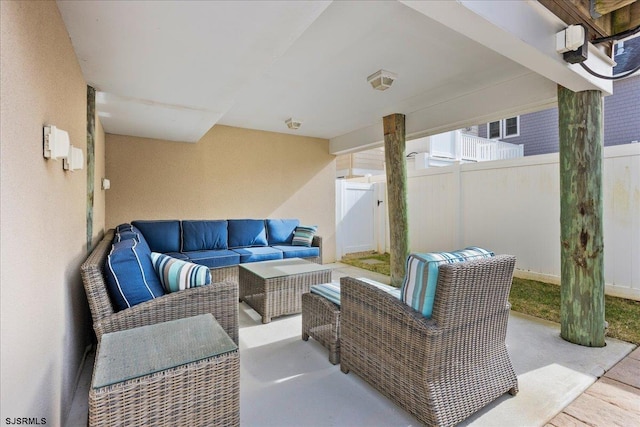 view of patio / terrace featuring fence and an outdoor living space