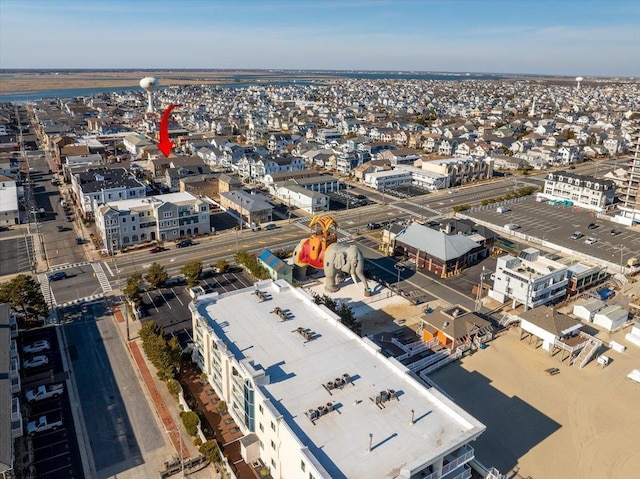 birds eye view of property with a view of city