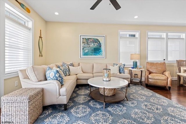 living room featuring ceiling fan, dark wood-style flooring, and recessed lighting