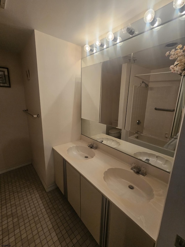 bathroom with double vanity,  shower combination, and a sink