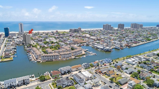 aerial view featuring a water view and a city view