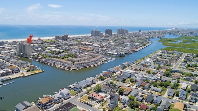 aerial view featuring a water view and a view of city