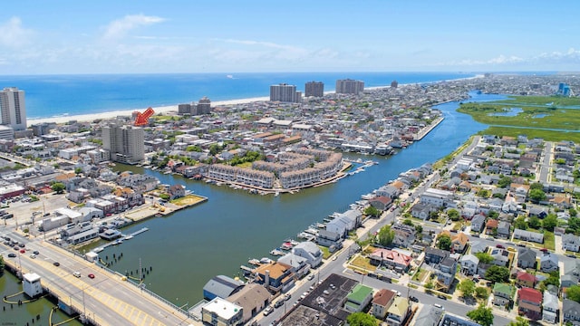 bird's eye view with a water view and a city view