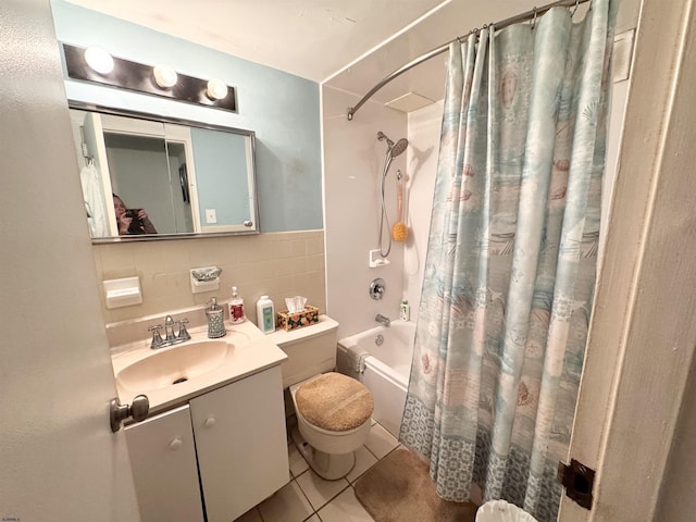 full bathroom featuring tile walls, shower / bathtub combination with curtain, toilet, vanity, and tile patterned floors