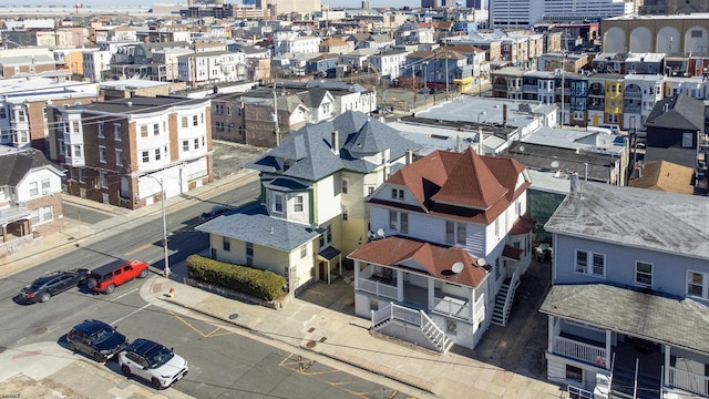 birds eye view of property with a view of city