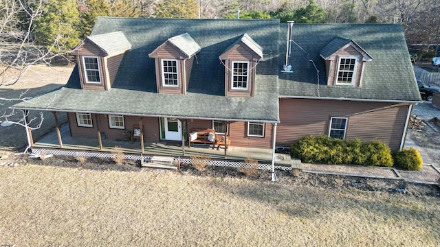 view of front facade with a shingled roof