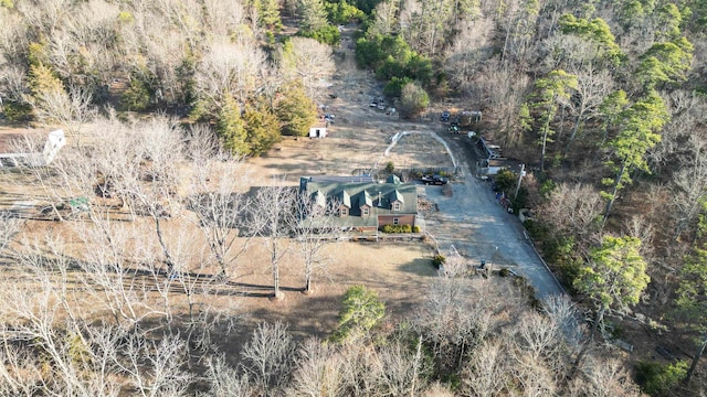 aerial view featuring a view of trees