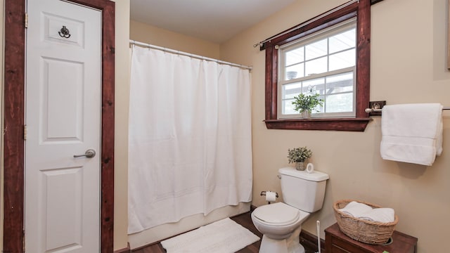 bathroom featuring toilet