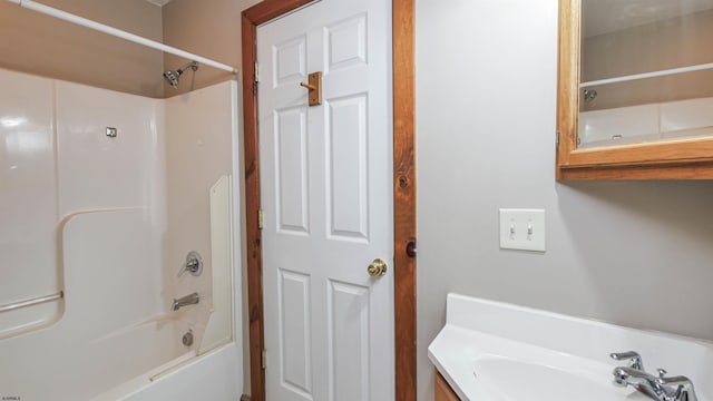 bathroom with shower / bath combination and vanity