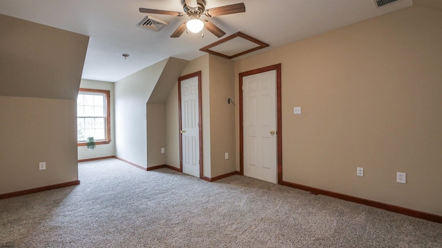 bonus room featuring baseboards, visible vents, and carpet flooring