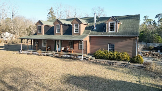 view of front of property featuring a porch and a front yard