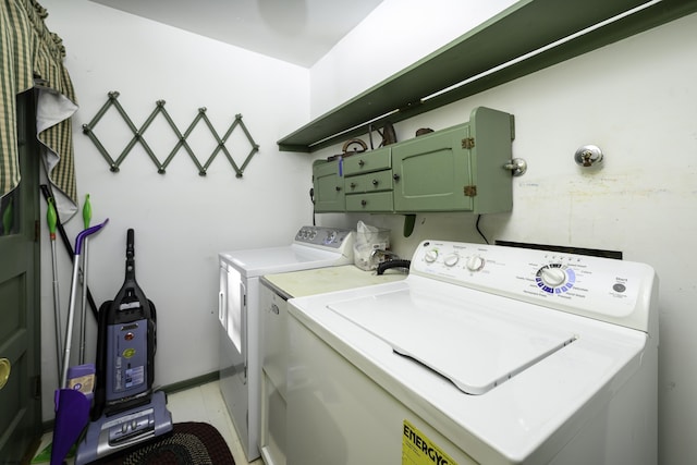 clothes washing area featuring laundry area and washer and dryer