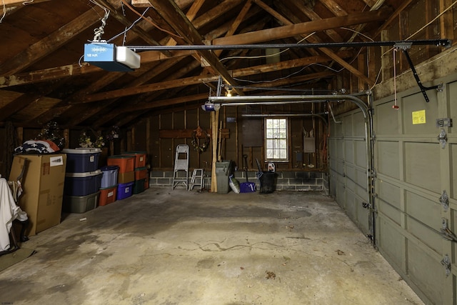 garage featuring a garage door opener