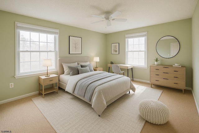 72 Arapaho Pl Unit 72, Absecon, NJ 08205 - bedroom featuring light colored carpet, baseboards, and ceiling fan