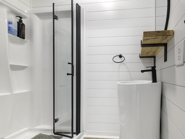 bathroom with a shower stall