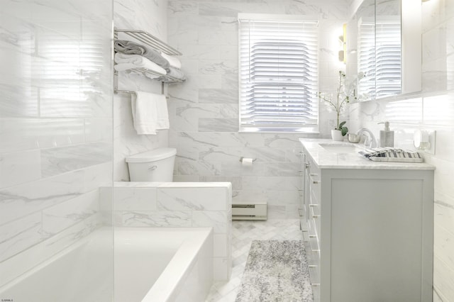 bathroom with baseboard heating, tile walls, and vanity